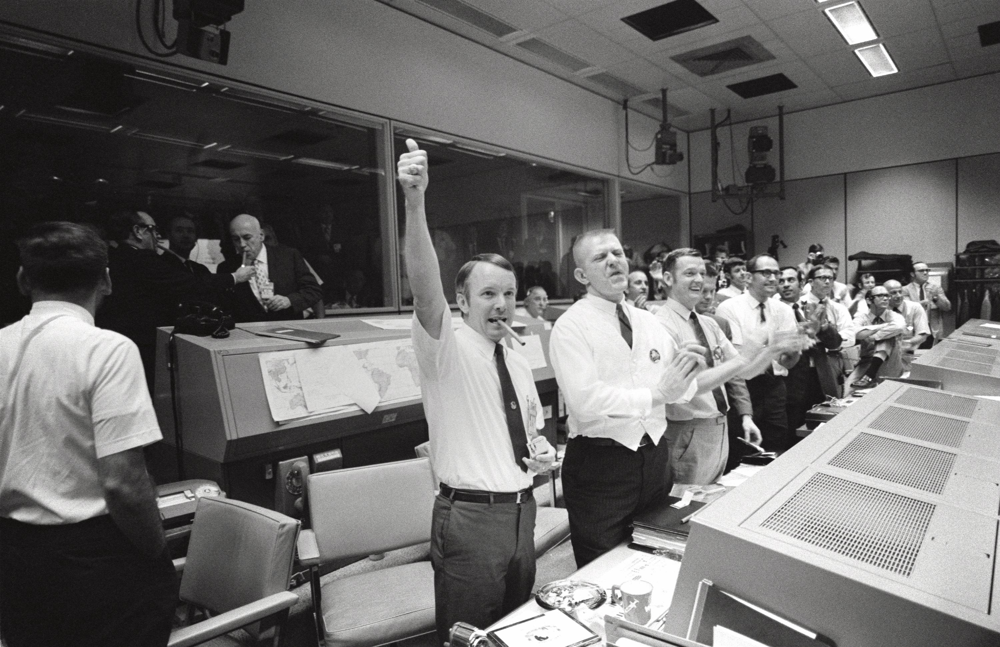 Mission Control celebrates the successful splashdown of Apollo 13 on April 17, 1970, after engineers and astronauts worked together to bring the damaged spacecraft safely back to Earth.